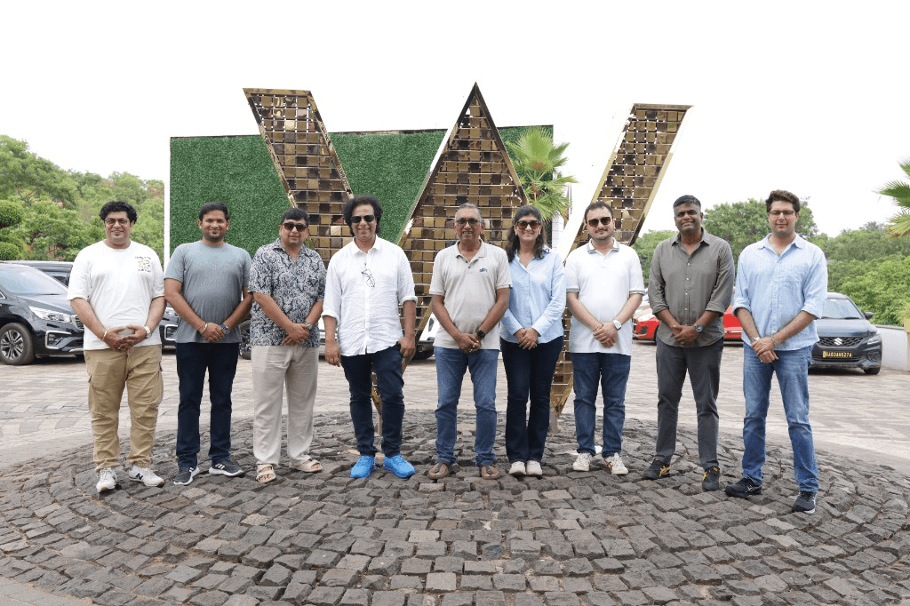 Corporate team photographed together outside W Goa, Vagator, by PK Photography
