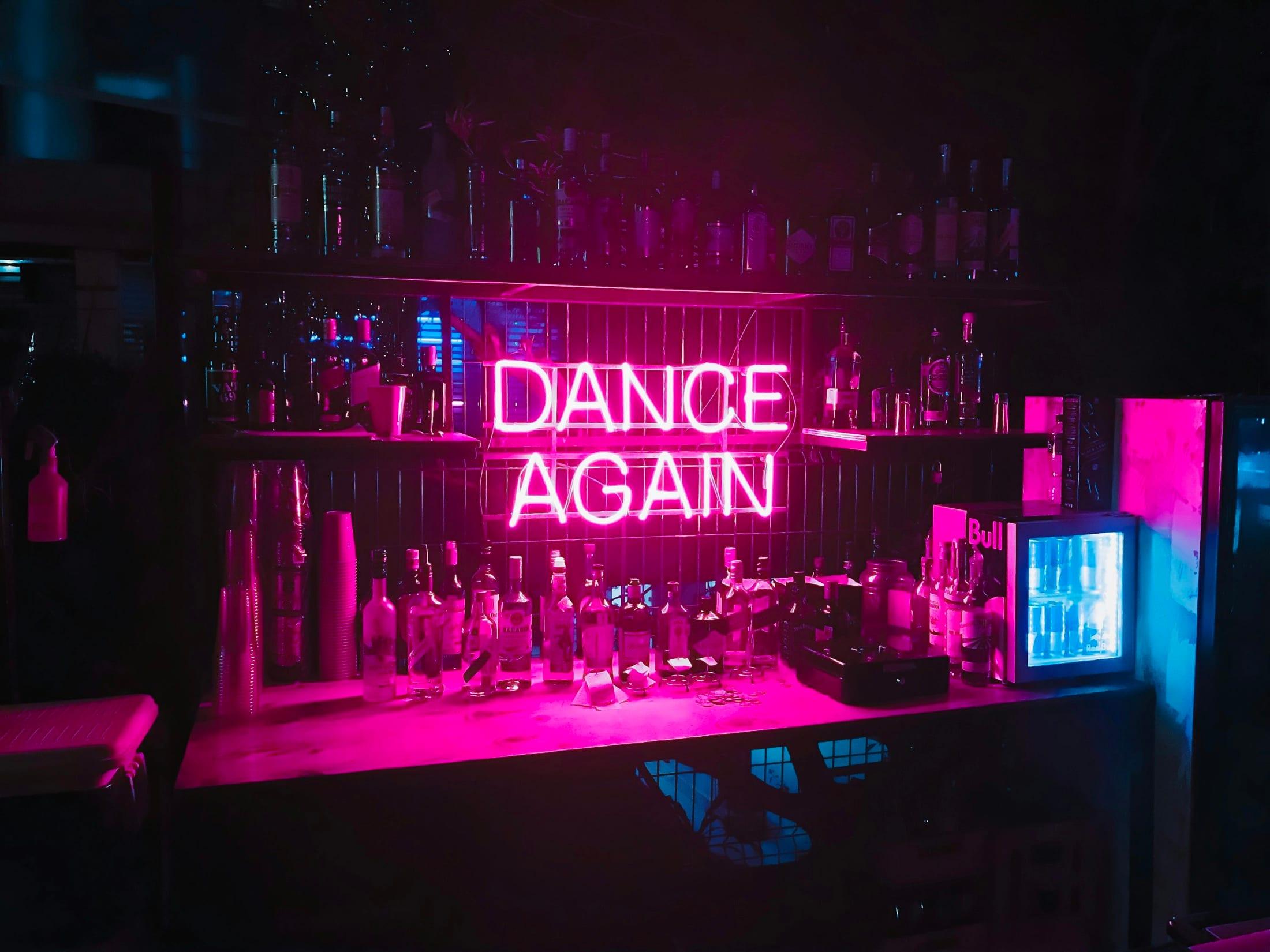Stage lighting and signage at a music venue