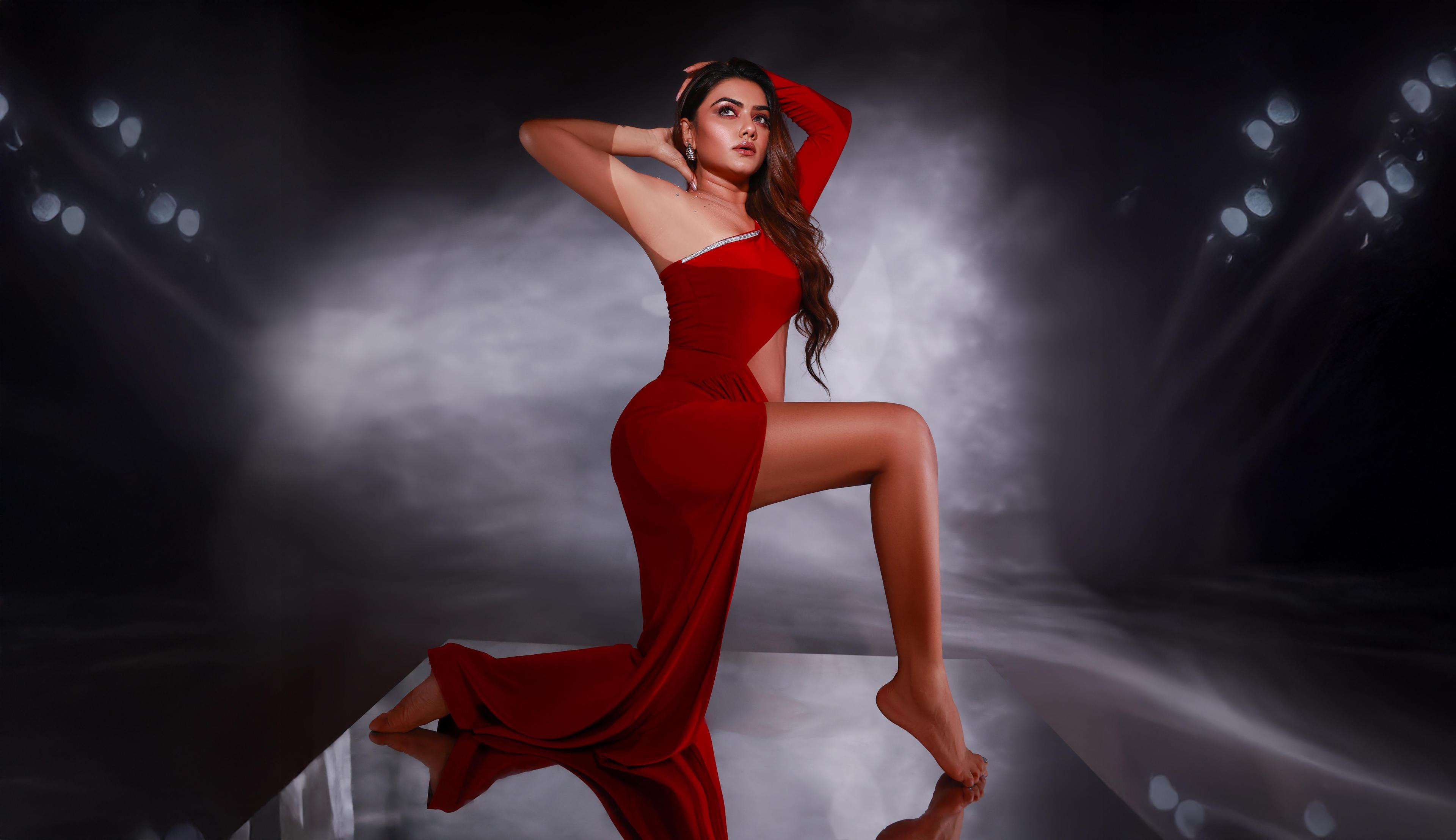 Editorial fashion portrait of a woman in a red gown, photographed by PK Photography